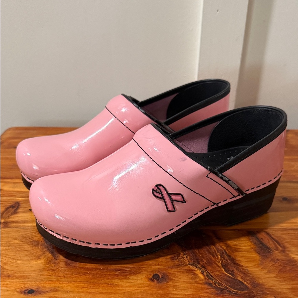 Dansko Pink Patent Leather Clogs with Ribbon Accent